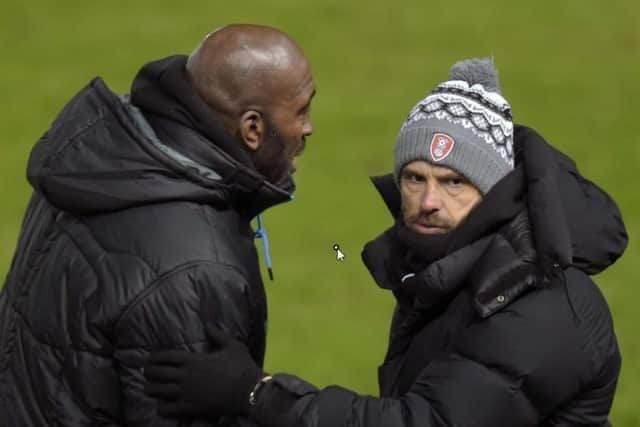 Rivals managers Darren Moore and Paul Warne, pictured during the latter's time at Rotherham United.