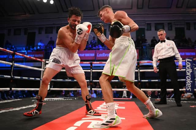 Codie Smith, right, punches Luca Genovese during their featherweight fight at York Hall on March 31, 2023 in London (Picture: Justin Setterfield/Getty Images)