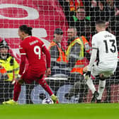 Liverpool's Darwin Nunez scores their side's first goal of the game against Sheffield United during the Premier League match at Anfield following an awful error from Blades keeper Ivo Grbic. Photo: Peter Byrne/PA Wire.