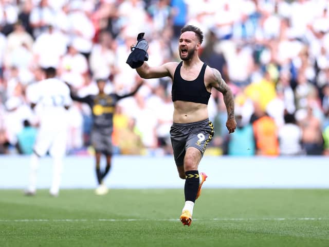 Matchwinner Adam Armstrong celebrates victory after Southampton secure promotion to the Premier League after defeating Leeds United in the Championship play-off final at Wembley. Photo by Alex Pantling/Getty Images.
