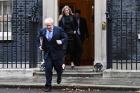 Cleo Watson with Boris Johnson in October, 2020. Picture: Stefan Rousseau/PA Photo.