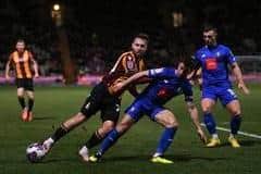 Action from Bradford City's derby with Harrogate Town. Picture: Jonathan Gawthorpe