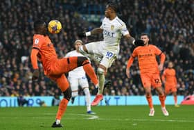 PROMOTION RIVALS: Leeds United's Crysencio Summerville and Axel Tuanzebe of Ipswich Town
