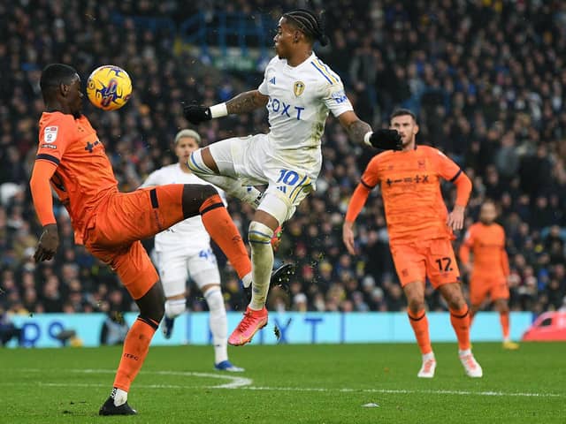 PROMOTION RIVALS: Leeds United's Crysencio Summerville and Axel Tuanzebe of Ipswich Town