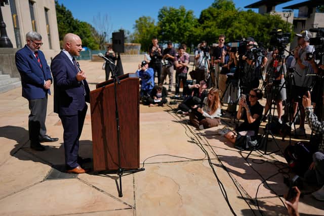 Christa Pike's attorney's Luke Ihnen, centre, and Randy Spivey, left, hold news conference after a court hearing Wednesday, Oct. 7, 2026, in Nashville, Tenn., where a judge granted their request for the Tennessee Department of Corrections to preserve all evidence related to the failed execution of Pike. (AP Photo/George Walker IV, Pool)