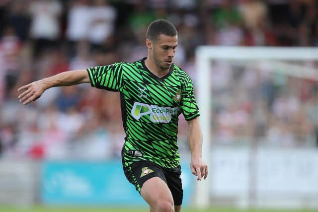 NORTHAMPTON, ENGLAND - AUGUST 27: Tommy Rowe of Doncaster Rovers in action during the Sky Bet League Two between Northampton Town and Doncaster Rovers at Sixfields on August 27, 2022 in Northampton, England. (Photo by Pete Norton/Getty Images)