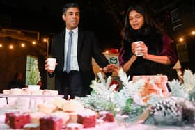Prime Minister Rishi Sunak and wife Akshata Murty visits a food and drinks market as he hosts a festive showcase at Downing Street, London, in the form of a street market to champion businesses from across the UK ahead of Small Business Saturday.