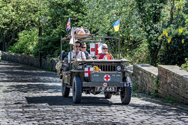 A Red Cross military Jeep on the cobbles