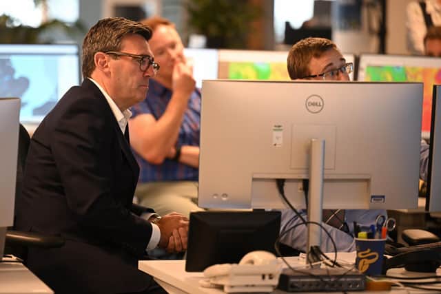 Prime Minister Andy Burnham meets with Dan Harris, Chief forecaster at the met office in Exeter. PIC: Finnbarr Webster/PA Wire