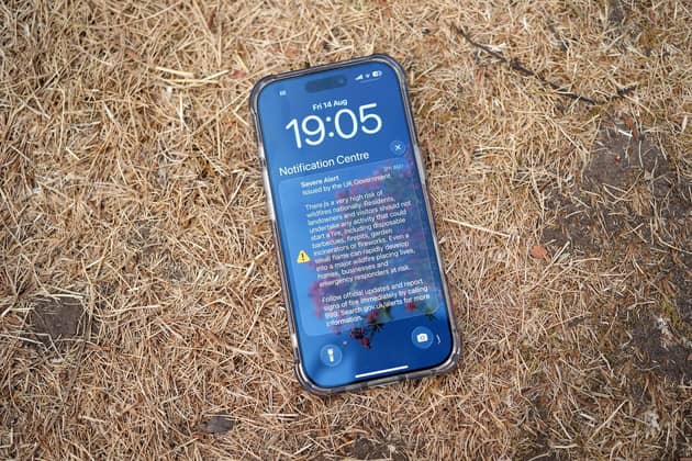 A general view of a phone warning against lighting anything that could spark a wildfire. PIC: Annabel Lee-Ellis/PA Wire