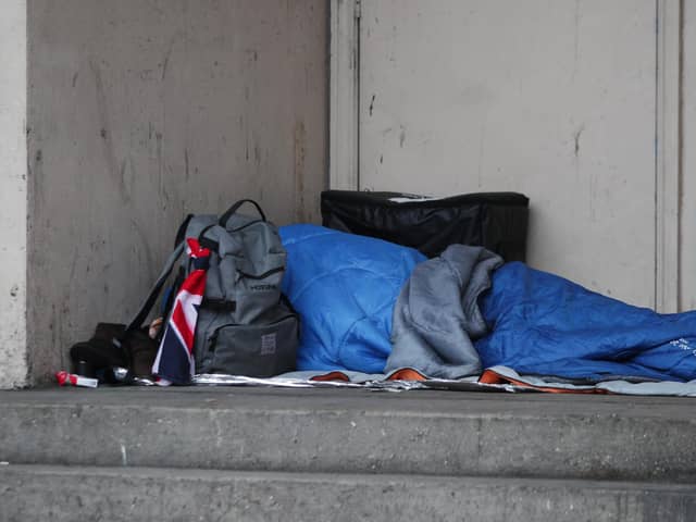 A homeless person sleeping rough in a doorway. PIC: Yui Mok/PA Wire