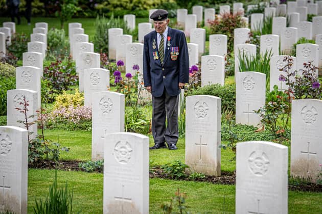 York's remaining D-Day veteran Ken Cooke, looks at the Commonwealth War Graves at Stonefall Cemetery in Harrogate, as the 80th anniversary gets closer,  photographed by Tony Johnson for The Yorkshire Post.