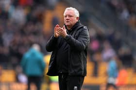 Chris Wilder applauds Sheffield United's fans at full-time following his team's defeat in the Premier League match at Wolverhampton Wanderers in late February. Photo by Catherine Ivill/Getty Images.