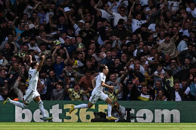 Leeds United midfielder Brenden Aaronson, right, celebrates after scoring his team's first goal during the English Premier League football match between Leeds United and Chelsea at Elland Road Picture: PAUL ELLIS/AFP via Getty Images.