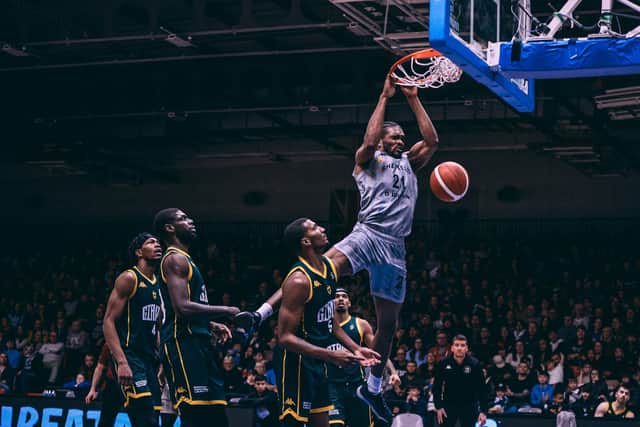 Slam dunk: Marcus Delpeche for two points for Sheffield Sharks against Manchester Giants (Picture: Adam Bates)
