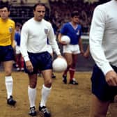 WE COULD BE HEROES: England's George Cohen, Gordon Banks and Ian Callaghan walk out before the match. Former England and Fulham defender George Cohen has died aged 83. Picture: PA Photos/PA Wire