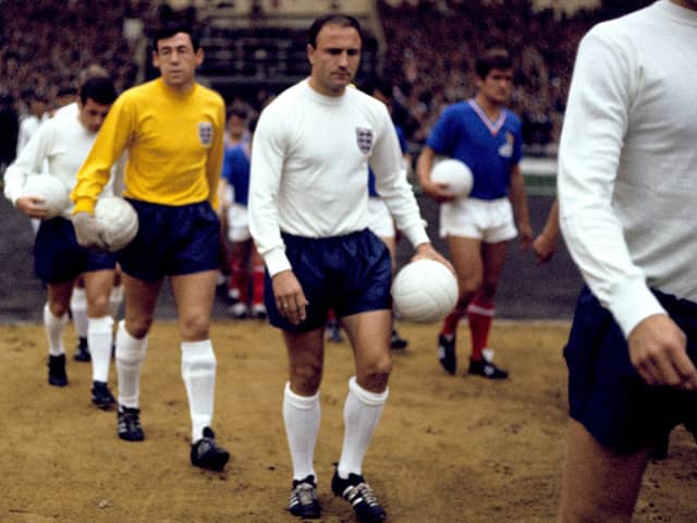 WE COULD BE HEROES: England's George Cohen, Gordon Banks and Ian Callaghan walk out before the match. Former England and Fulham defender George Cohen has died aged 83. Picture: PA Photos/PA Wire