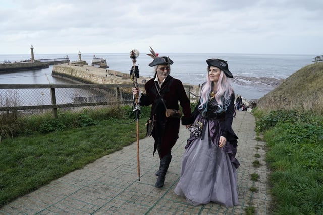 People attend the Whitby Goth Weekend in Whitby, Yorkshire, as hundreds of goths descend on the seaside town where Bram Stoker found inspiration for 'Dracula' after staying in the town in 1890. Picture date: Sunday October 30, 2022.