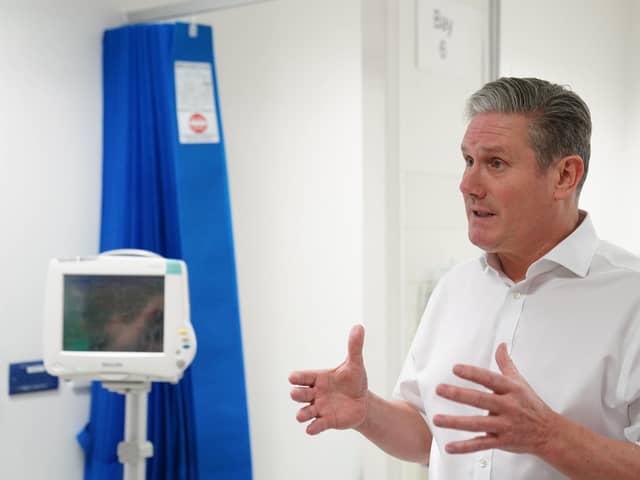 Labour leader Sir Keir Starmer during a visit to the theatre recovery ward in the Bexley Wing of St James' University Hospital in Leeds