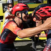 On the rise: Ineos Grenadiers' Polish rider Michal Kwiatkowski, left, celebrates his win on Stage 13 of the Tour de France with Tom Pidcock, who finished fifth. (Picture: CHRISTOPHE PETIT TESSON/POOL/AFP via Getty Images)