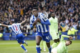 Anthony Musaba wheels away in celebration after opening the scoring for Sheffield Wednesday against West Brom (Picture: Steve Ellis)
