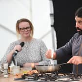 MasterChef 2022 winner Eddie Scott (right) during his cooking demonstration at the Live Cookery Theatre at Harrogate Food and Drink Festival 2022