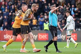 "WHO, ME?": Oli McBurnie protests his innocence as referee David Webb chalks off a goal by Hull City's Kyle Joseph (Image: Tony King/Getty Images)