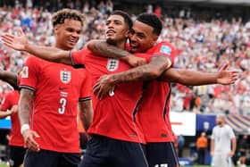STAR TURN: England's Jude Bellingham  celebrates with team-mates after scoring against on Saturday Picture: AP /Steve Luciano.