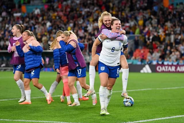 Millie Bright and England players celebrate the team's victory through the penalty shoot out. (Pic credit: Justin Setterfield / Getty Images)