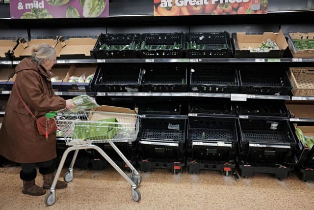 Empty fruit and vegetable shelves at an Asda. A shortage of tomatoes affecting UK supermarkets is widening to other fruit and vegetables and is likely to last weeks. PIC: Yui Mok/PA Wire