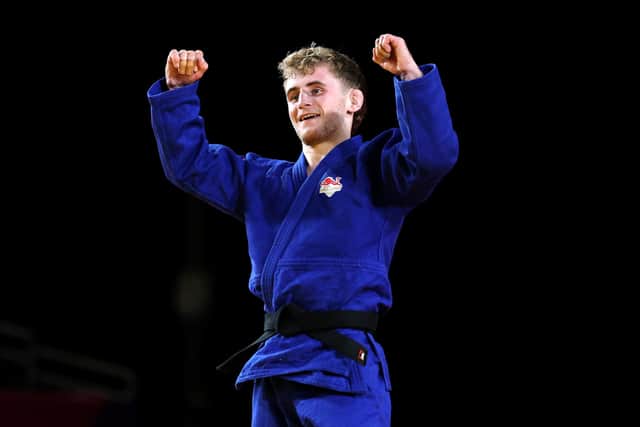 Bounce back: Middlesbrough's Charlie Ayre celebrates victory against Regan Wali of Team Kenya during the Men -60 kg contest for the Commonwealth Games bronze medal at the SEC Centre (Picture: Lintao Zhang/Getty Images)