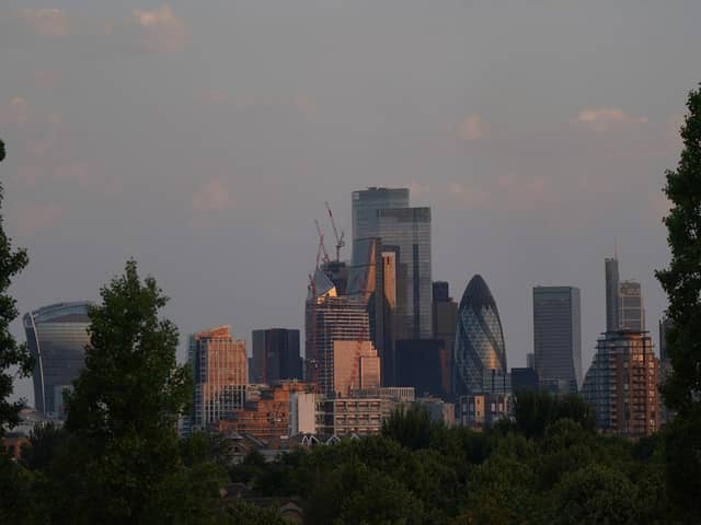 UK banks are set to reveal another set of strong profits, but the cracks could be forming as higher borrowing costs and pressure to raise savings rates takes a toll.( Photo by Yui Mok/PA Wire)