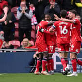 Middlesbrough player Isaiah Jones (11) is congratulated by team mates after scoring the second goal during the Sky Bet Championship match against Sheffield Wednesday at the Riverside Stadium. Photo by Stu Forster/Getty Images.