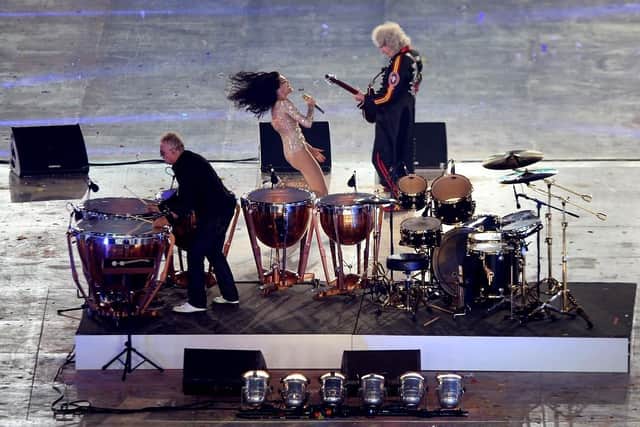 Jessie J performs with Brian May and Roger Taylor of Queen during the London 2012 Olympic Games. (Pic credit: Clive Brunskill / Getty Images)