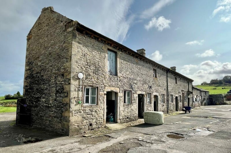 The beautiful stone stables are Grade II listed