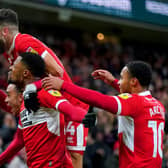 Middlesbrough's Chuba Akpom (bottom centre) celebrates with his team-mates after scoring their side's first goal of the game during the Sky Bet Championship match at the Riverside Stadium, Middlesbrough. Picture date: Tuesday March 14, 2023. PA Photo. See PA story SOCCER Middlesbrough. Photo credit should read: Owen Humphreys/PA Wire.RESTRICTIONS: EDITORIAL USE ONLY No use with unauthorised audio, video, data, fixture lists, club/league logos or "live" services. Online in-match use limited to 120 images, no video emulation. No use in betting, games or single club/league/player publications.