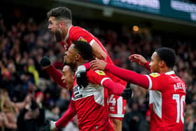 Middlesbrough's Chuba Akpom (bottom centre) celebrates with his team-mates after scoring their side's first goal of the game during the Sky Bet Championship match at the Riverside Stadium, Middlesbrough. Picture date: Tuesday March 14, 2023. PA Photo. See PA story SOCCER Middlesbrough. Photo credit should read: Owen Humphreys/PA Wire.RESTRICTIONS: EDITORIAL USE ONLY No use with unauthorised audio, video, data, fixture lists, club/league logos or "live" services. Online in-match use limited to 120 images, no video emulation. No use in betting, games or single club/league/player publications.
