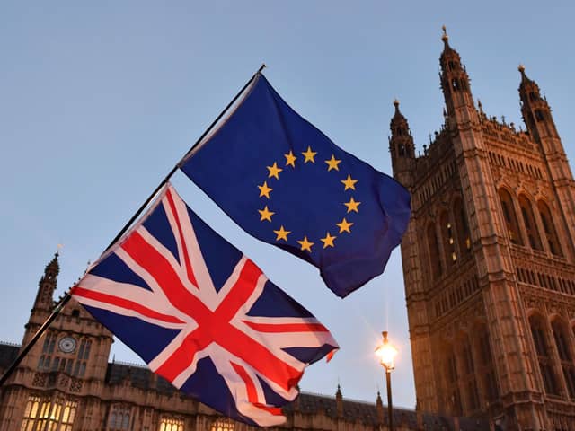 EU and Union Flags outside the Houses of Parliament. PIC: BEN STANSALL/AFP/Getty Images.