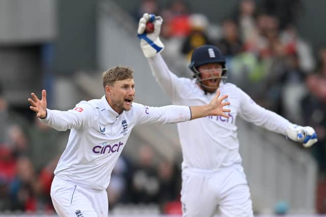 Joe Root, left, and Jonny Bairstow appeal for a wicket during the Old Trafford Test. Photo by Gareth Copley/Getty Images.