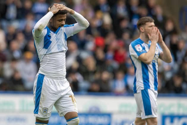 DIVIDED: Huddersfield Town fans turned on their players in Saturday's 4-0 defeat at home to Swansea City
