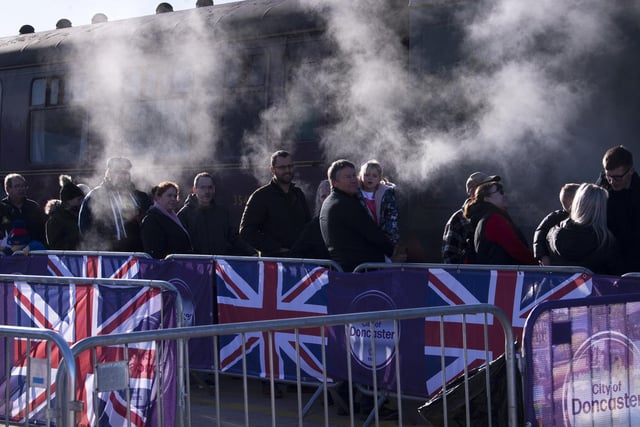 Crowds welcome back the Flying Scotsman back to Doncaster,  Freightliner Railport, Decoy Bank South, Doncaster. Picture taken by Yorkshire Post Photographer Simon Hulme