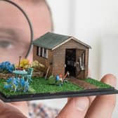 Graham Shapley takes a close look of 'Grandads Shed' by the creator known as Sheffield Miniatures. Photographed for The Yorkshire Post  by Tony Johnson.