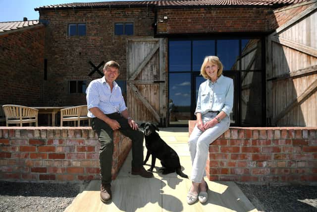 Great Yorkshire Show, show director Charles Mills on his farm at Appleton Roebuck, near York.
Pictured with his wife Jill, outside their barn wedding venue.