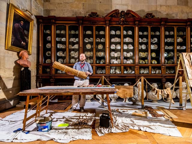 Pictured Nick Hesp from Hesp Jones & Co Ltd  based at Beningbrough, York,  specialist Decoration and Restoration working in the China Landing inside Castle Howard. Picture By Yorkshire Post Photographer,  James Hardisty.