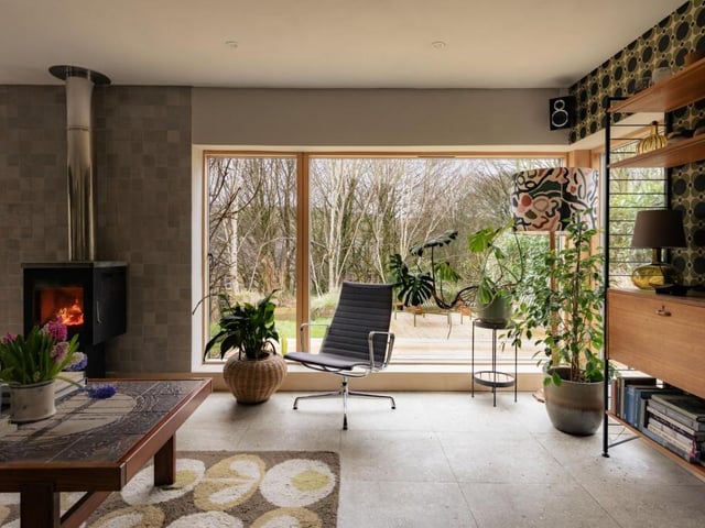 A Westfire log burner with Soapstone top, occupies a central position.
