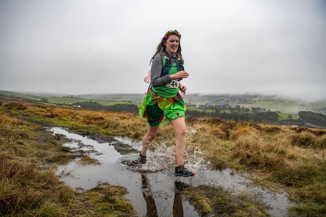 A fairy runner tackles the the moors in the Auld Lang Syne fell race