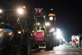 Farmers take part in a tractor "go-slow" in, central London, to raise awareness of the difficulties for the British farming industry which are putting food security at risk. PIC: Jordan Pettitt/PA Wire