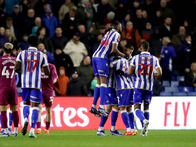 SHEFFIELD, ENGLAND - JANUARY 06: Josh Windass of Sheffield Wednesday celebrates with teammates after scoring his team's first goal during the Emirates FA Cup Third Round match between Sheffield Wednesday and Cardiff City at Hillsborough on January 06, 2024 in Sheffield, England. (Photo by Jess Hornby/Getty Images)