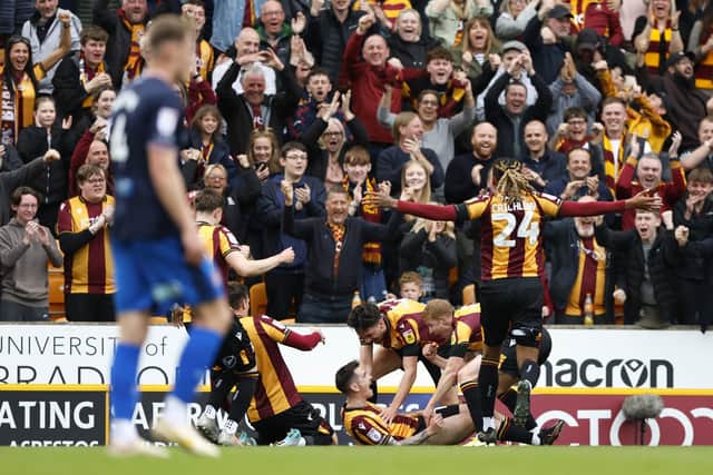 Bradford City's Jamie Walker celebrates scoring their side's first goal of the game during the Sky Bet League Two play-off semi-final first leg match at the University of Bradford Stadium, Bradford. Picture date: Sunday May 14, 2023. PA Photo. See PA story SOCCER Bradford. Photo credit should read: Richard Sellers/PA Wire.

RESTRICTIONS: EDITORIAL USE ONLY No use with unauthorised audio, video, data, fixture lists, club/league logos or "live" services. Online in-match use limited to 120 images, no video emulation. No use in betting, games or single club/league/player publications.