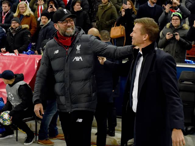 SALZBURG, AUSTRIA - DECEMBER 10, 2019: Jurgen Klopp Manager of Liverpool with Jesse Marsch Manager of  RB Salzburg during the UEFA Champions League group E match between RB Salzburg and Liverpool FC at Red Bull Arena on December 10, 2019 in Salzburg, Austria. (Photo by Andrew Powell/Liverpool FC via Getty Images)
